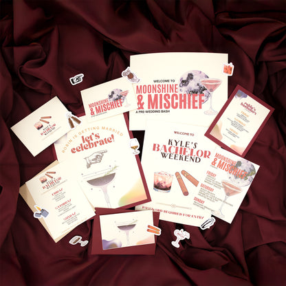Collection of themed party invitations on a maroon fabric background