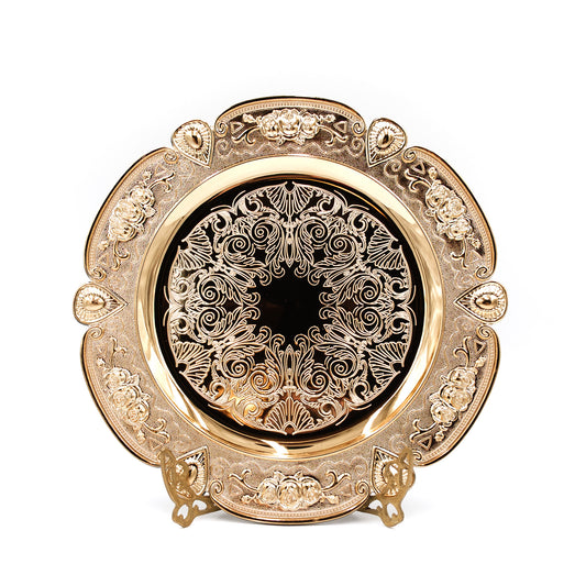 Decorative gold charger with intricate patterns 